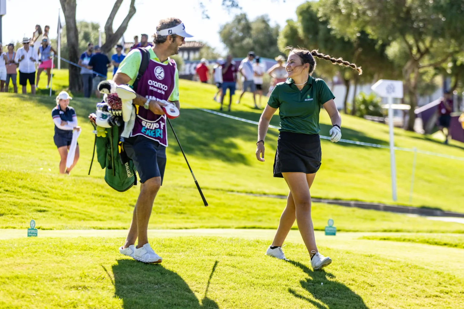 Female college golf athlete on golf course