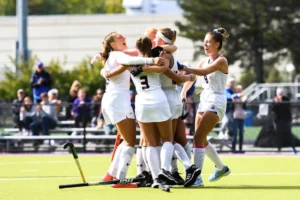 Female university athletes cheering