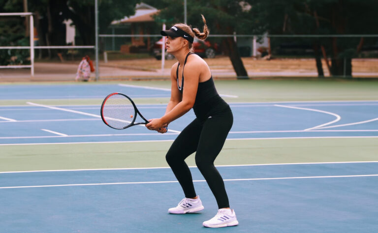 Tennis player Jasmin Hauska on tennis court