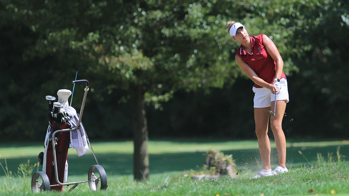 Cathi Graf playing golf