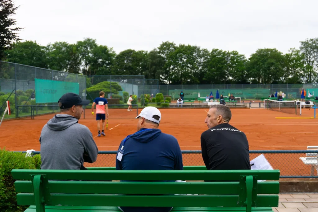 College coaches watching a match at Keystone Sports college tennis showcase.