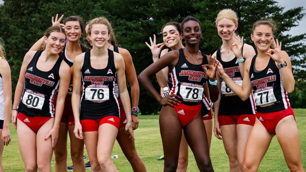 Jacksonville State cross country runners posing before a race
