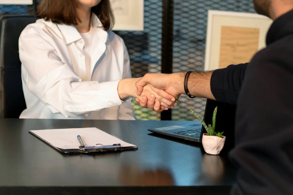 Handshake representing a successful job opportunity