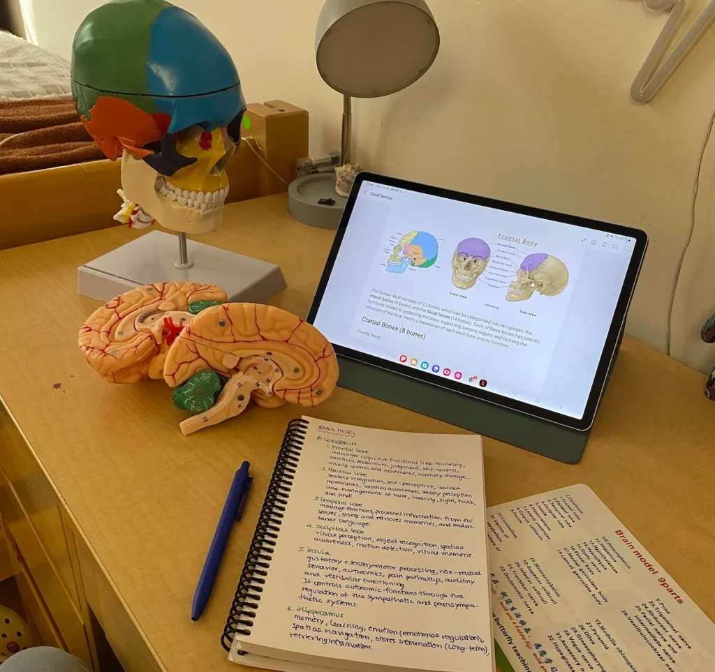 Student-athlete completing her biology homework.