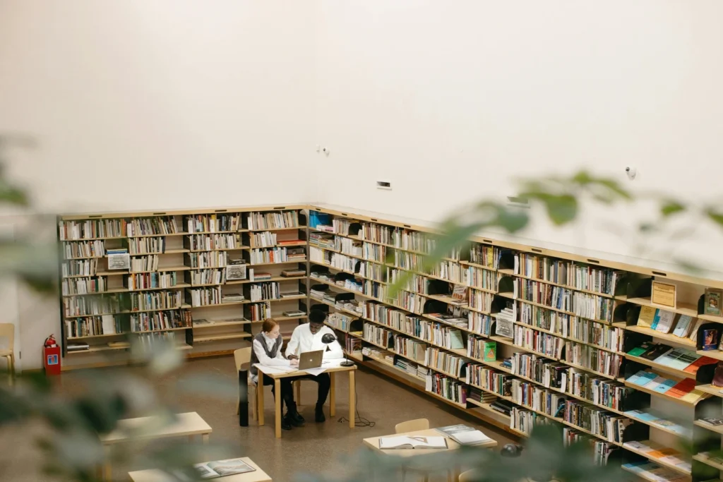 student in library
